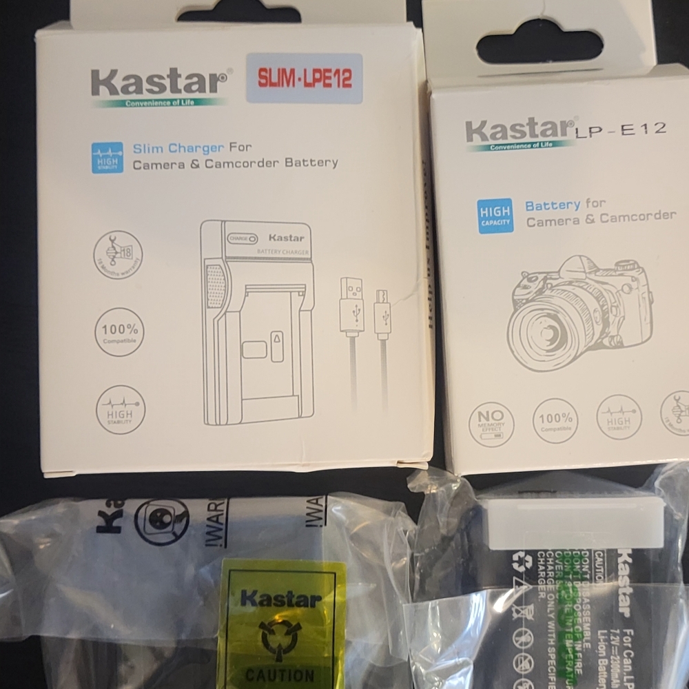 2 lp-e12 batteries and 2 lp-e12 Battery chargers for canon cameras